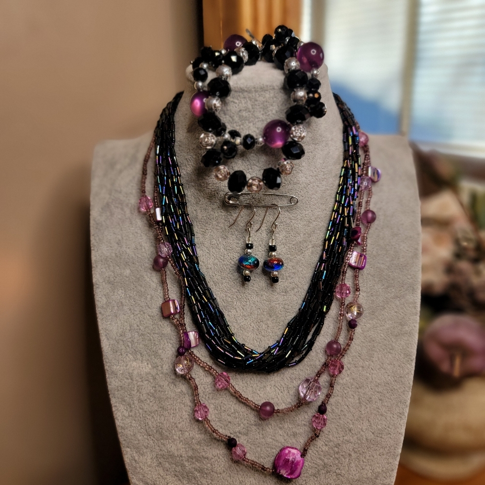Bundle Of 2 Necklaces, 2 Bracelets, and 1 Pair Of Earrings Purple and Black